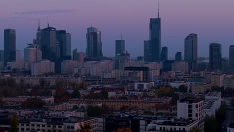 warsaw, poland. aerial view of downtown cityscape skyline in twilight, central towers, skyscrapers and residential buildings