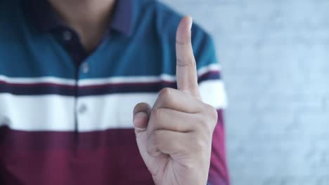 person pointing with finger