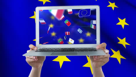 bandera europea ondeando en la pantalla del portátil