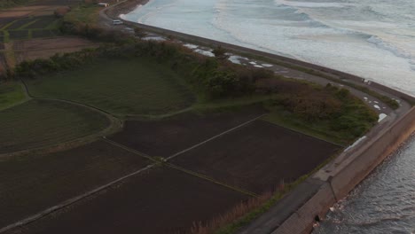 Tottori-Coast-with-Windmills-in-the-distance,-Sea-of-Japan