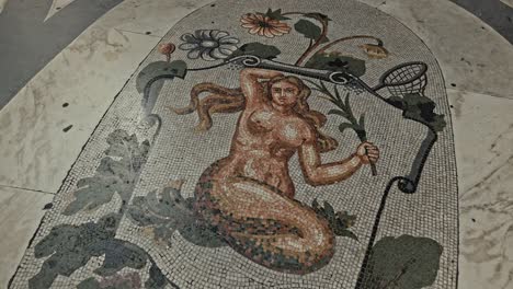 mosaic mermaid at galleria umberto, naples