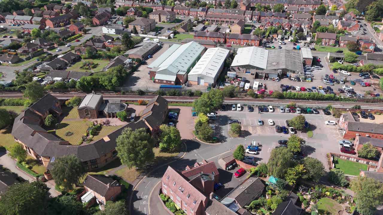 Aerial view of Oakham, Rutland in sunny daytime, showing buildings and streets