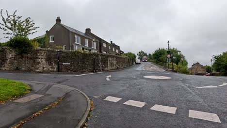 a car drives through a residential street