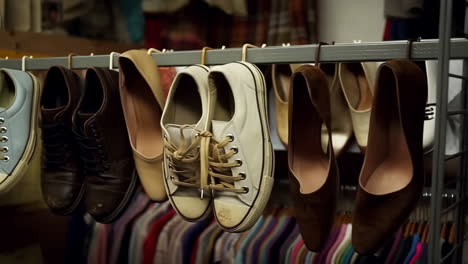 various shoes hanging in a closet