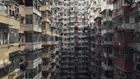 Aerial of an old apartment complex called Yick Fat on Quarry Bay, Hong Kong, China