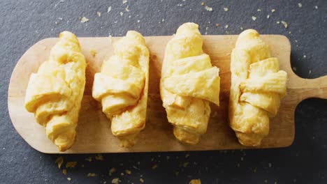 Video-of-close-up-of-croissants-on-gray-background