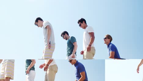 friends walking on rock at beach