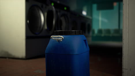 blue container in a laundry mat