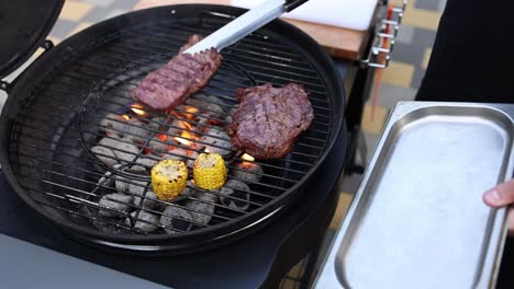 grilled steak and corn on the cob