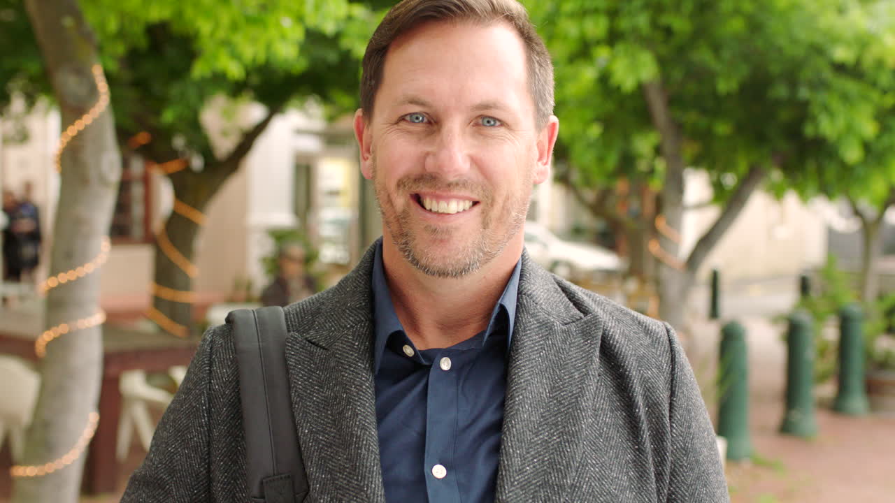 Portrait of a mature businessman out in the city