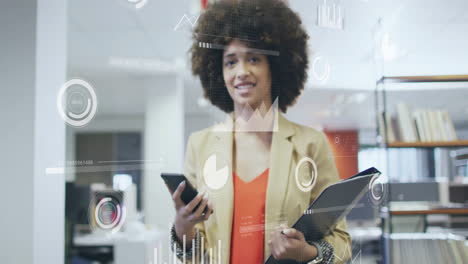 animation of data processing over african american businesswoman using smartphone in office
