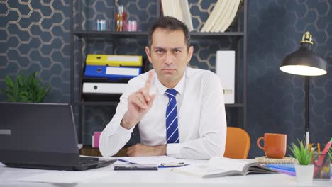 Businessman-looking-at-camera-angry-and-aggressive.