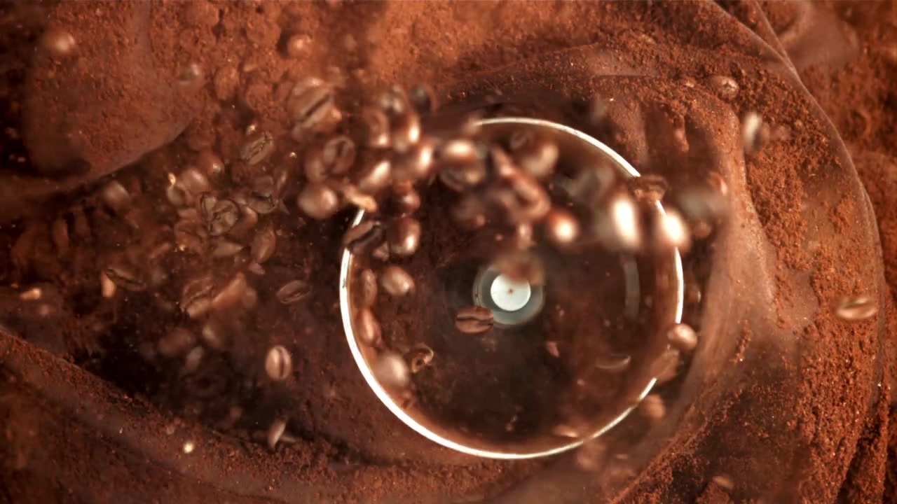 Overhead View of Coffee Beans Grinding into Powder in Slow Motion