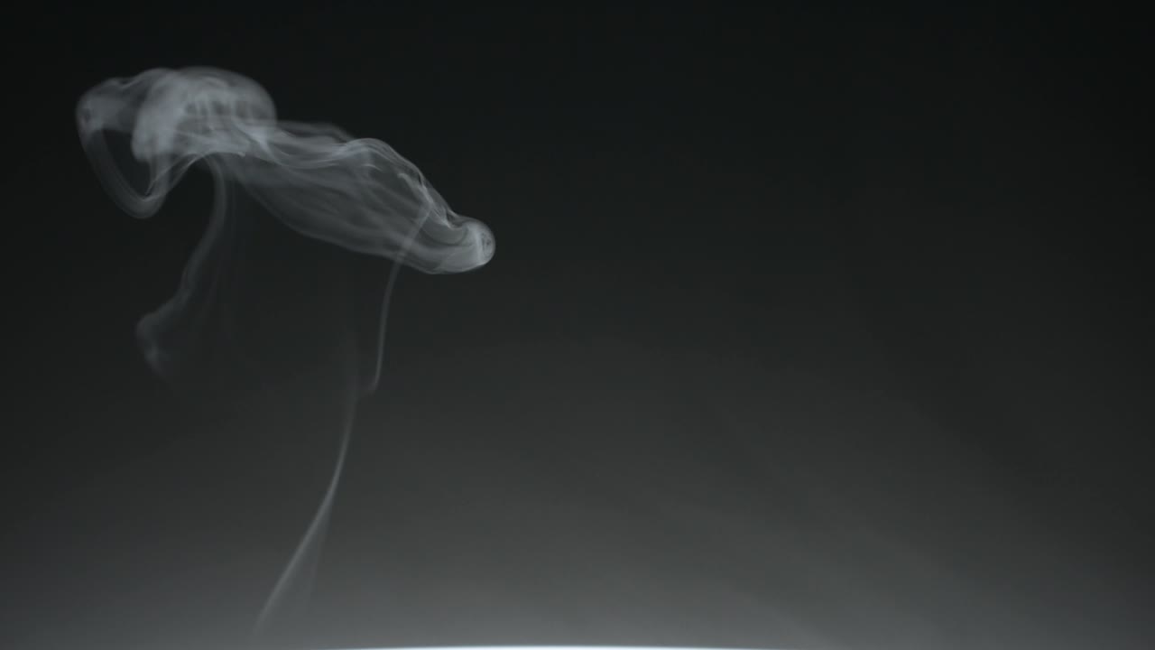 Rauch Nebel Feuer rauchig Licht Dampf dunkler abstrakter Hintergrund farbenfroher Textureffekt