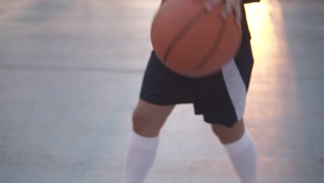 female basketball basketball player bouncing the ball