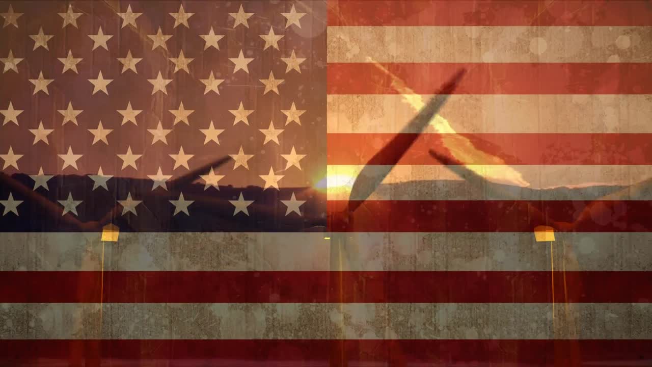 turbina eólica contra la bandera estadounidense