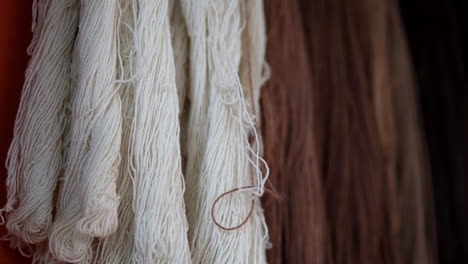 natural colored dark white tan brown fibers of woven yarn, detailed closeup