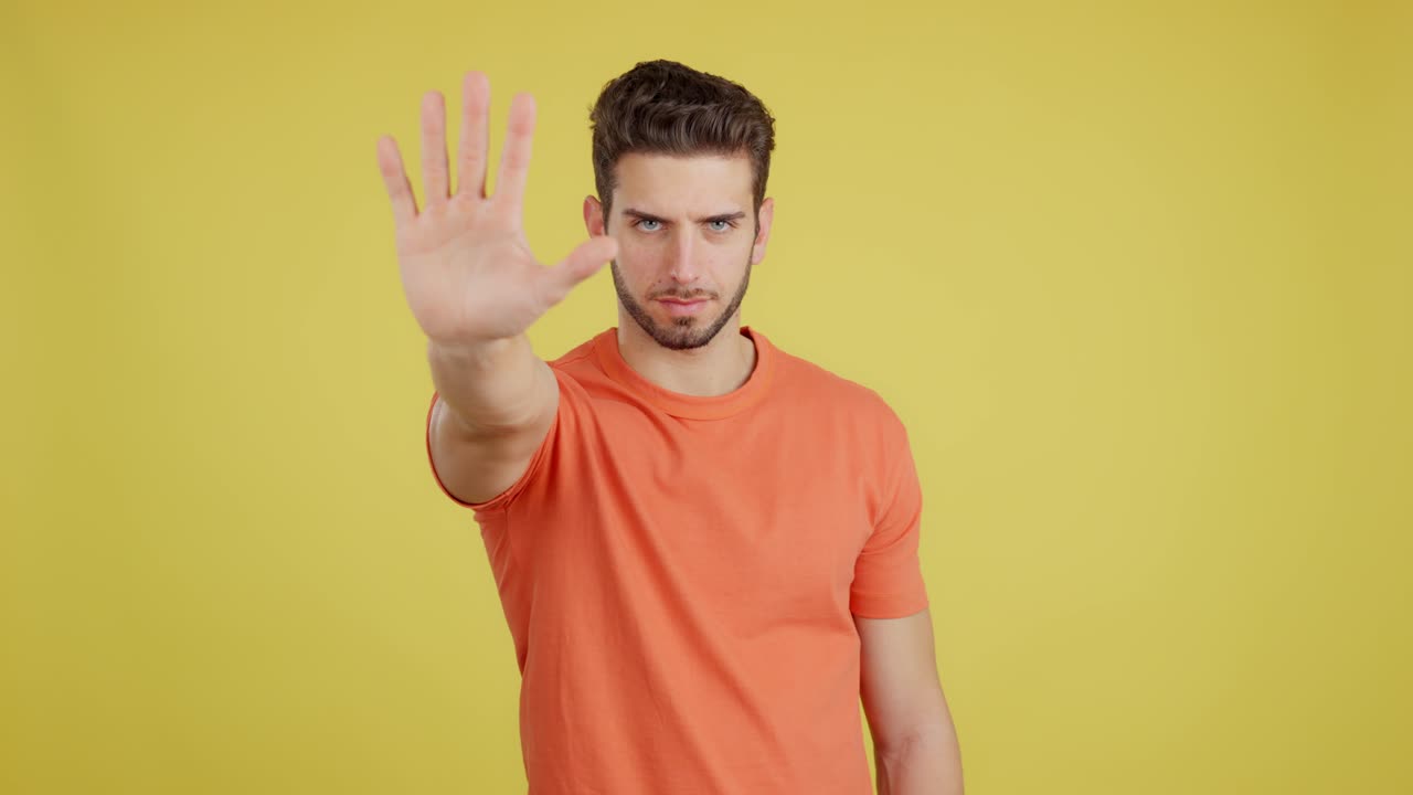 Man making a stop gesture with his hand
