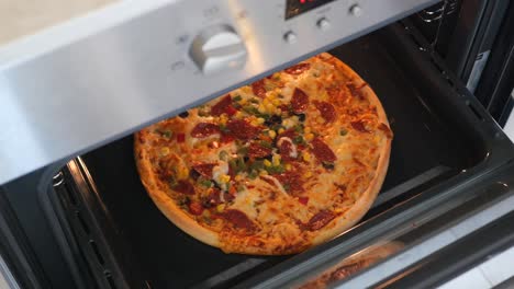 delicious homemade pizza baking in the oven