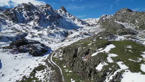 French-Pyrenees-Mountain-Landscape-Covered-in-Snow---Aerial-4k