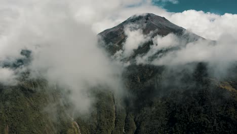 Aerial-View-Of-Misty-Landscape-Of-Tungurahua-Volcano-In-Baños-De-Agua-Santa-In-Ecuador---Drone-Shot