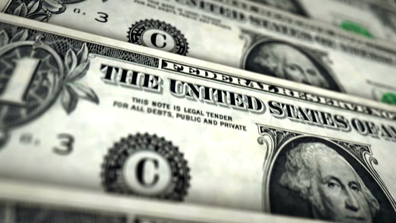 animación de bucle en la superficie del billete de un dólar