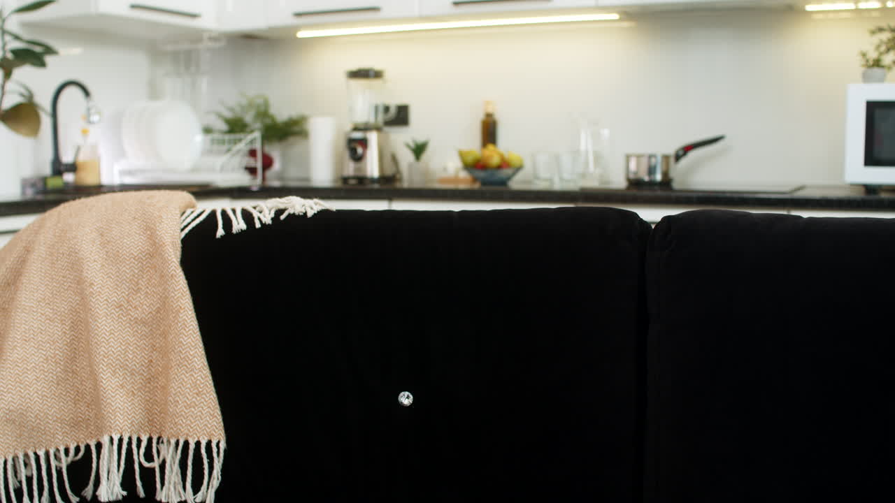 Young woman sits down to relax breathes deep and eases body and mind after long work with calm mood