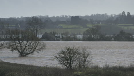 flooded farm land in somerset, england