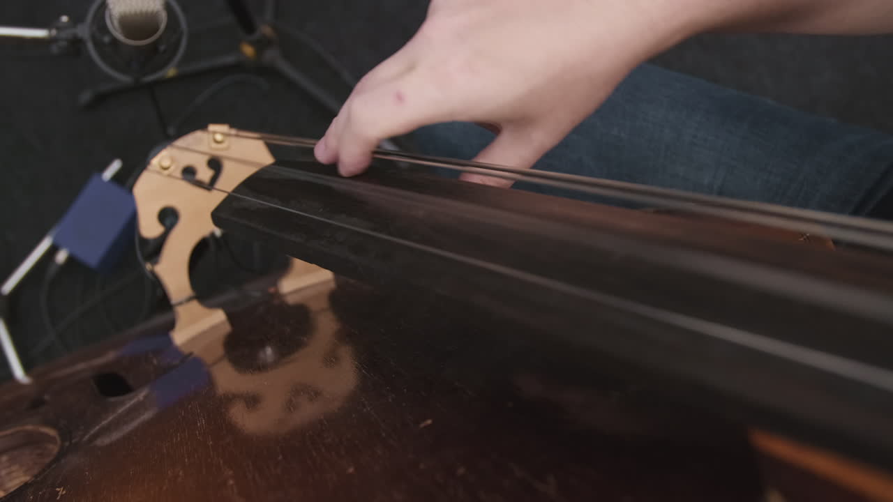 Jazz Man Playing Contrabass In Recording Studio