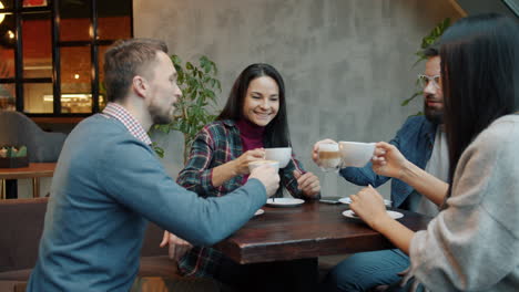 friends enjoying coffee at a cafe