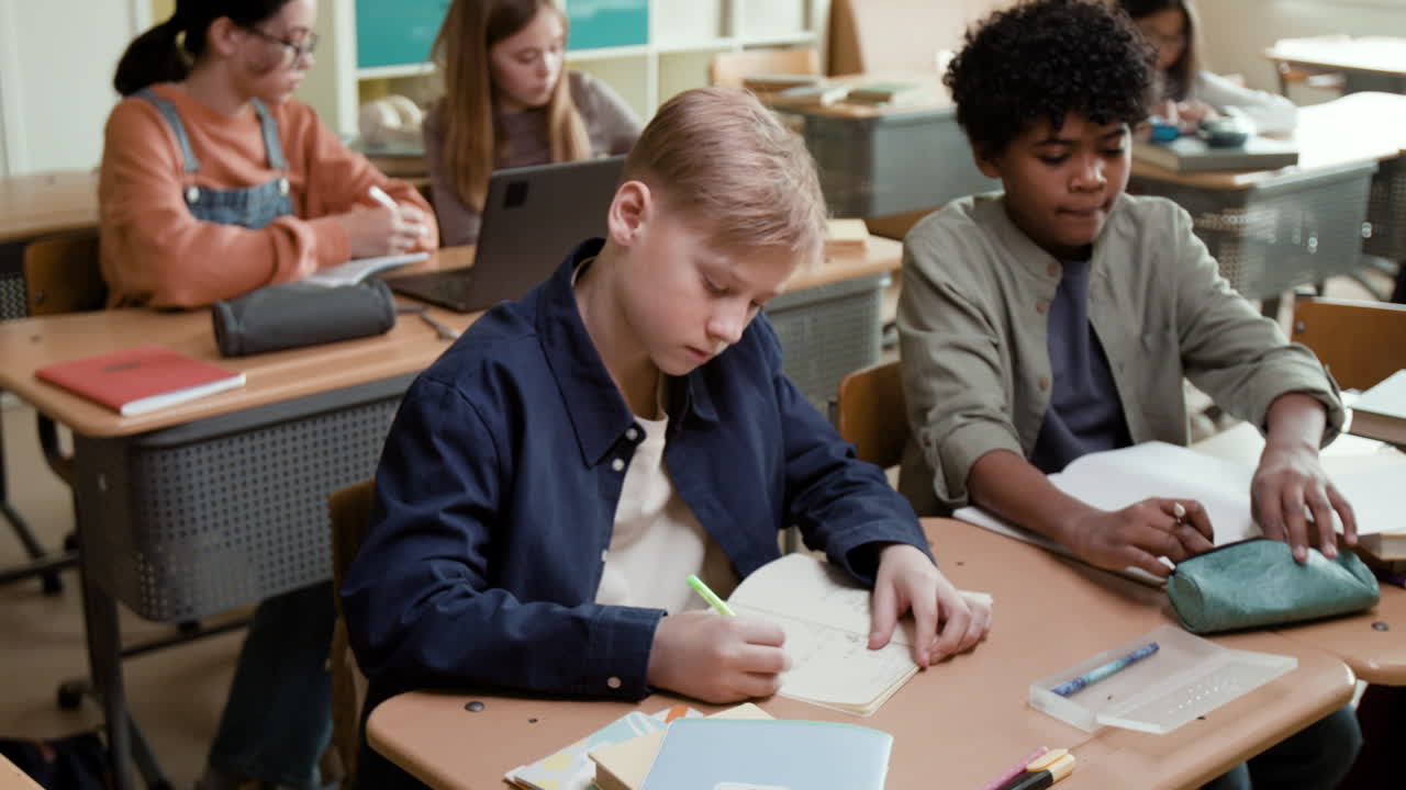 Students focused on their studies in a classroom