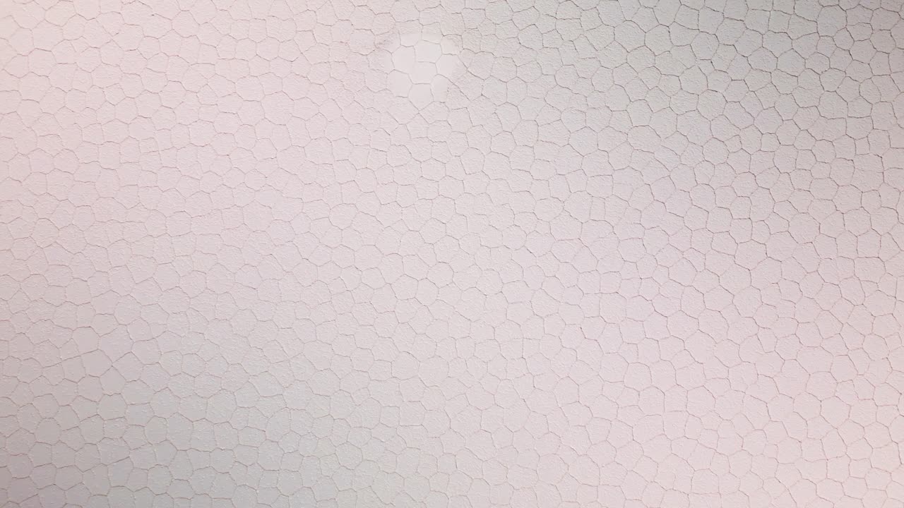 Hexagonal Pattern On The Surface Of Uyuni Salt Flat As A Result Of Salt Crystallization. - aerial overhead shot