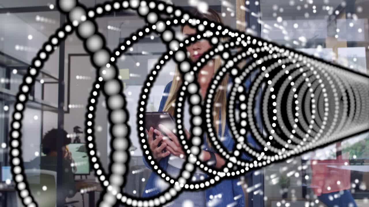 Woman tapping tablet colleague entering with phone and pointing, rings showing data for tech demo