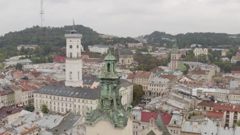 aerial drone video of european city lviv, ukraine, rynok square, central town hall, latin cathedral