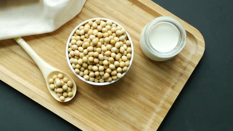 Soy-milk-pouring-in-a-glass-jar-,