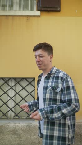 man walking down a yellow street