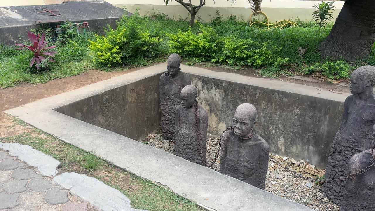 Slaves statue in stone town zanzibar island tanzania