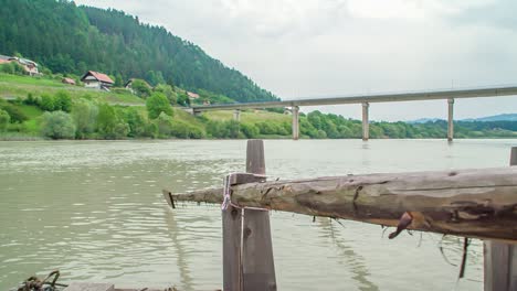 rustic wooden boat with large oars on the river