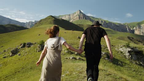 couple hiking in mountains