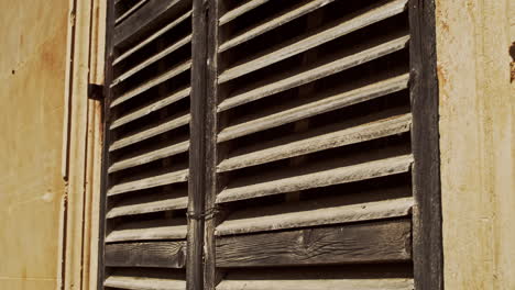 wooden shabby window shutters