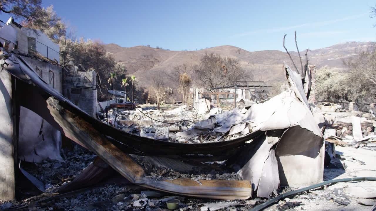 Wide Panning Shot of Burned Down Home in Malibu from Woolsey Fire