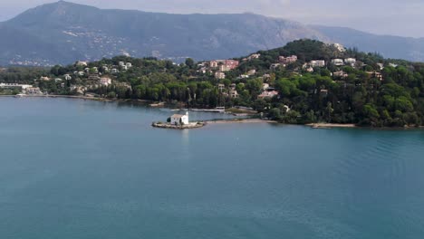 famous church in komeno bay aerial view in summer