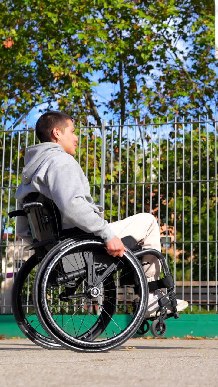 Man in Wheelchair Playing Basketball