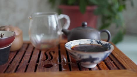 portable table for the tea ceremony. tea in a bowl