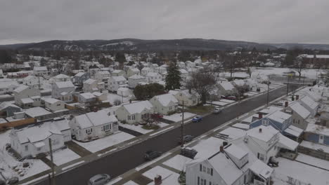 aerial view of homes in binghamton, new york. shot in the west end on a winter day.