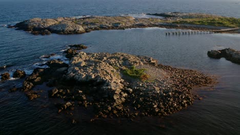 distant drone view open ocean isolated rocky islands