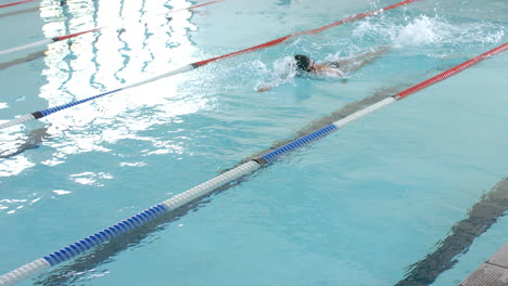 Swimmer-in-action-at-an-indoor-pool