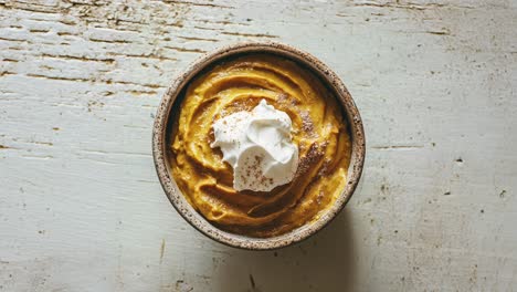 pumpkin spice mousse with whipped cream topping