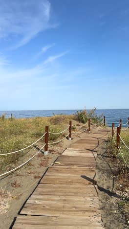 wooden walkway leading to the beach