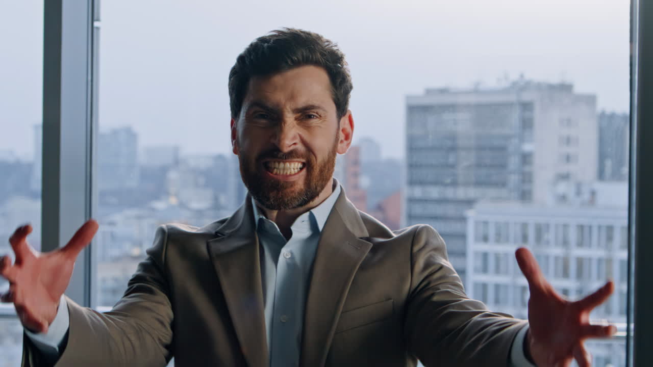Portrait angry boss gesturing hands at panoramic office. Man screaming loudly